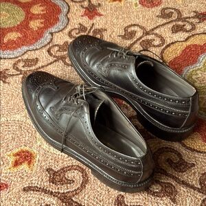 Vintage Nettleton Traditions black wingtip shoes size 11 A/C (see photos).